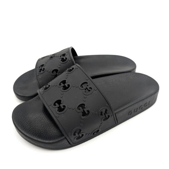 Gucci Black Rubber GG Laser Cut Pool Slide Sandals Unisex Size US W6 EU37 - Picture 1 of 11